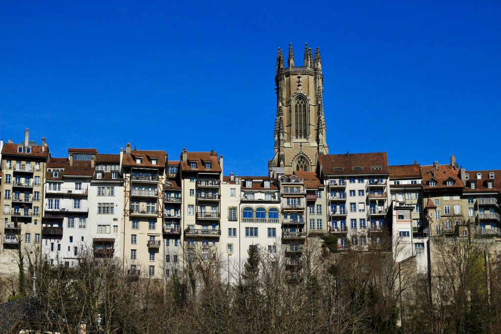 View of buildings along a valley at Fribourg, Switzerland.